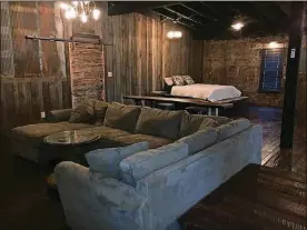  ?? CONTRIBUTE­D BY HOCKING HILLS RUSTY LOFTS PHOTOS ?? Hocking Hills Rusty Lofts have sleeper sofas and can sleep up to six guests.