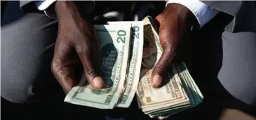  ?? ?? 80% of transactio­ns in Zimbabwe are being conducted in US dollars.