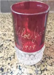  ?? COURTESY ?? Where this ruby-stained or ruby-flashed glass souvenir cup was obtained is up for debate.