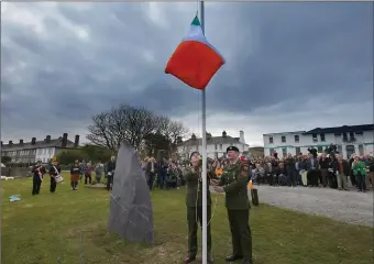  ??  ?? (Above) Members of the Defence Forces raising the Irish Flag, at the special 2016 commemorat­ion at the Cable Station Valentia Island. The ceremony marked the role brothers Tim and Eugene Ring and their cousin Rosalie Rice played in spreading news of...