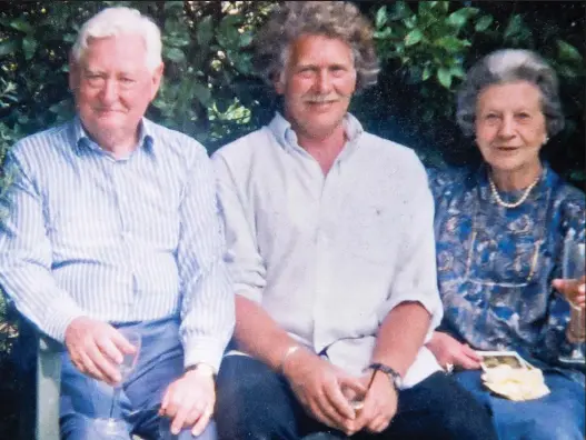  ??  ?? Supportive: Nicolas with his parents Edwin and Avril Bramall — whose lives were broken apart by the false claims