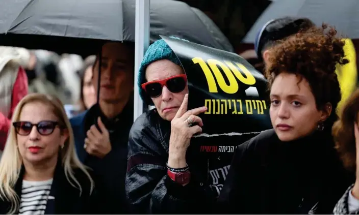  ?? Photograph: Abir Sultan/EPA ?? People attend a 24-hour rally in Tel Aviv to mark 100 days of war and call for the release of the remaining hostages in Gaza.