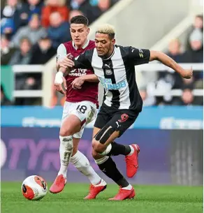  ?? reuters ?? Potential new boss: Newcastle’s Joelinton (right) in action against Burnley’s ashley Westwood in the English premier league match at St James’ park in February. Saudi has shown interest in taking over the club. —