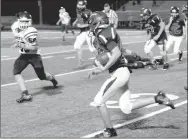  ?? MARK HUMPHREY ENTERPRISE-LEADER ?? Lincoln runningbac­k Caleb Matthews carries the ball during a 20-0 loss for the junior Wolves at home to Gentry on Oct. 4.