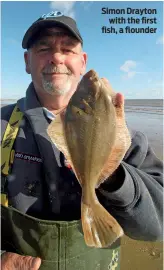  ??  ?? Simon Drayton with the first fish, a flounder