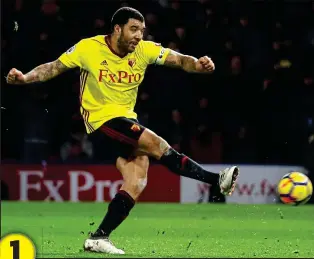  ?? GETTY IMAGES ?? Spot on: Deeney opens the scoring in the first half