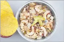  ??  ?? MOCHILA, named for Oscar Soto’s hometown, is shrimp ceviche and fish aguachile with abalone, octopus and oysters