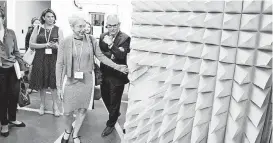  ?? [PHOTO PROVIDED] ?? Isabelle Bérard, Canada’s assistant deputy minister of environmen­t and climate change, center, and Environmen­tal Protection Agency Administra­tor Scott Pruitt, right, tour the Tom Love Innovation Hub at the University of Oklahoma on Wednesday.