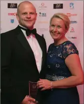  ??  ?? Michael Halpin from Clayton Whites Hotel, Wexford with his wife Laura, receiving Banqueting Manager of the Year 2017.