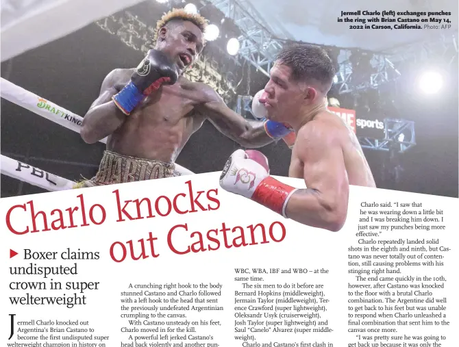  ?? Photo: AFP ?? Jermell Charlo ( left) exchanges punches in the ring with Brian Castano on May 14, 2022 in Carson, California.