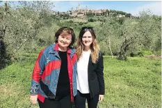  ??  ?? Courtney Bonnell, with mom Cathy, says the stunning views from Palazzo Vecchio in Florence were worth the pair’s climb up the tower.