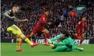  ??  ?? The form of Alisson, saving here from Southampto­n’s Danny Ings, has also been key for Liverpool. Photograph: Phil Noble/