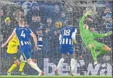  ?? ?? Adam Webster (left) scored Brighton’s equaliser with a powerful header against Chelsea on Tuesday.