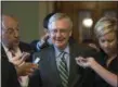  ?? J. SCOTT APPLEWHITE — ASSOCIATED PRESS ?? At the Capitol on Thursday, Senate Majority leader Mitch McConnell smiles after unveiling his caucus's health care legislatio­n.