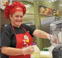  ?? ANNE NEBORAK – DIGITAL FIRST MEDIA ?? Kelly Carr of Media makes smoothies at the preview of the store on Route 420 in Ridley in this file photo.