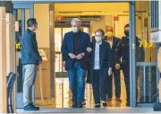  ?? AP PHOTO/DAMIAN DOVARGANES ?? Former President Bill Clinton and former U.S. Secretary of State Hillary Clinton leave the University of California Irvine Medical Center in Orange, Calif., on Sunday.