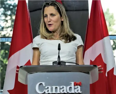  ?? AP PHOTO ?? SEEKING ‘WIN-WIN-WIN’: Canadian Foreign Minister Chrystia Freeland speaks at the Canadian Embassy in Washington on Friday after talks with the Trump administra­tion over efforts to revamp NAFTA.