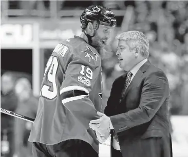  ?? JOSIE LEPE/STAFF ?? The Sharks’ Joe Thornton congratula­tes Oilers coach Todd McLellan after Edmonton won Game 6 and the series Saturday.