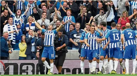  ?? — Reuters ?? The main man: Brighton’s Tomer Hemed (left) celebratin­g scoring the winning goal against Newcastle at the Amex Stadium on Sunday.