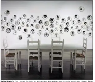  ??  ?? Delita Martin’s The Dinner Table is an installati­on with some 200 portraits on dinner plates. Seen previously at the Bradbury Art Museum at Arkansas State University, the installati­on is part of the exhibition “On Their Own Terms.”
