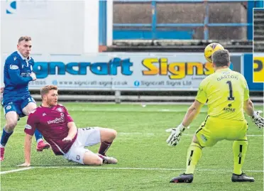  ??  ?? Connor Shields scores his second to make it 2-0 for Queen of the South against Arbroath