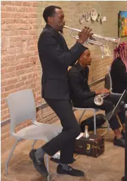  ?? (Special to The Commercial/Richard Ledbetter) ?? UAPB Professor Lemanuel Williams presents an improvisat­ional solo on trumpet.