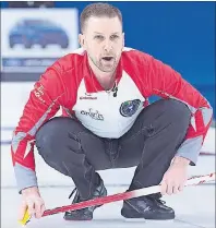  ?? CP PHOTO ?? Newfoundla­nd and Labrador skip Brad Gushue watches a rock as they play Manitoba in 1 vs. 2 Page playoff game action at the Tim Hortons Brier curling championsh­ip at Mile One Centre, in St. John’s on Friday.