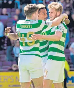  ?? Picture: SNS. ?? Celtic’s Scott Sinclair, centre, celebrates his goal with teammates Stuart Armstrong and James Forrest.
