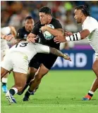 ?? ?? All Blacks hooker Codie Taylor is tackled by England’s Manu Tuilangi during the World Cup semifinal in 2019. England won 19-7.