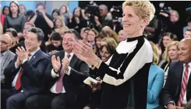  ?? FRANK GUNN THE CANADIAN PRESS ?? Ontario Premier Kathleen Wynne applauds staff and patients during a CAMH mental health funding announceme­nt in Toronto on Wednesday.