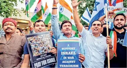  ?? ?? BJP supporters in India holding a rally in support of Israel: Has India abandoned the Palestinia­ns' freedom cause?
