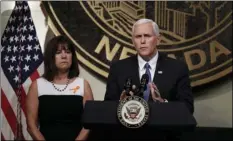  ?? BREKKEN ?? Vice President Mike Pence, accompanie­d his wife, Karen, speaks in Las Vegas on Saturday following a unity prayer walk honoring the victims of last weekend’s massacre. AP PHOTO/ISAAC