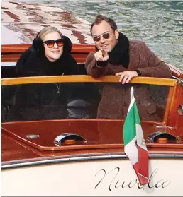  ??  ?? MAKING A POINT: Jude Law and girlfriend Phillipa Coan in a water taxi