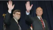  ?? SCOTT APPLEWHITE — THE ASSOCIATED PRESS FILE ?? In 1991, President George H.W Bush and William Barr wave after Barr was sworn in as the new Attorney General of the United States at a ceremony in Washington.