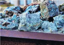  ??  ?? Raw copper ore . . . Copper is crucial to the manufactur­ing of new generation electric cars.