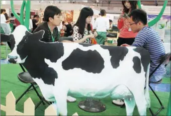  ?? WU CHANGQING / FOR CHINA DAILY ?? The stand of Yili Industrial Group Co Ltd at an industry expo in Beijing.