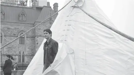  ?? JUSTIN TANG/THE CANADIAN PRESS ?? Prime Minister Justin Trudeau leaves the indigenous protesters’ teepee on Parliament Hill on Friday morning.