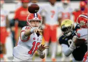  ?? BRIAN BLANCO/ AP ?? Clemson quarterbac­k Trevor Lawrence has thrown for 2,753 yards and 22 touchdowns in nine games, helping Clemson reach the playofffor the third time in his career.