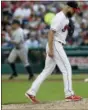  ?? TONY DEJAK — ASSOCIATED PRESS ?? Indians starting pitcher Corey Kluber waits for the Yankees’ Brett Gardner to run the bases after Gardner hit a two-run home run in the third inning July 12 in Cleveland.