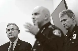  ?? Staff file photo ?? Bexar County District Attorney Joe Gonzales looks on in 2019 as Sheriff Javier Salazar speaks at a news conference. At right is Police Chief William McManus. Gonzales said cite-and-release has been widely praised by judges, police and the criminal defense bar.