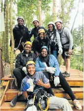  ??  ?? TREE FELLA: The writer, back right, and friends with Tsitsikamm­a Canopy Tour guide Heiney Jacobs, front.