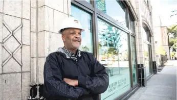  ?? PAT NABONG/SUN-TIMES ?? Senior Project Manager of the Auburn Gresham Healthy Lifestyle Hub Camellio Lincoln stands outside the center last month.