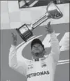  ?? ASSOCIATED PRESS FILE PHOTO ?? Superstar driver Lewis Hamilton could be celebratin­g a world championsh­ip come Sunday.