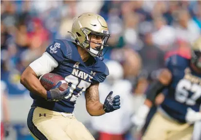  ?? JULIO CORTEZ/AP ?? Navy wide receiver Jayden Umbarger, an Archbishop Spalding graduate, showed star potential as a sophomore by averaging almost 12 yards on double-reverse plays.