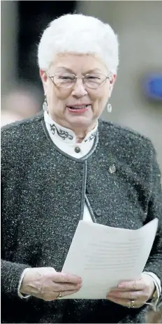  ?? JONATHAN HAYWARD/CANADIAN PRESS ?? Conservati­ve MP Elsie Wayne stands in the House of Commons during Question Period on Parliament Hill in Ottawa in 2004. Wayne, the former mayor of Saint John who was one of only two Conservati­ve M-P’s left standing in the 1993 federal election, has died.