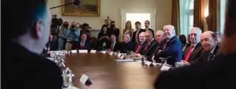  ?? —AP ?? WASHINGTON: US President Donald Trump laughs during a Cabinet meeting on Monday in the Cabinet Room of the White House.