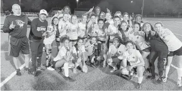  ?? ANDRE FERNANDEZ The Miami Herald ?? Plantation American Heritage girls’ soccer players and coaches celebrate after defeating Archbishop McCarthy 1-0 in the Region 4-5A final at McCarthy on Tuesday night.