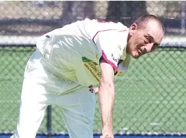  ??  ?? Drouin’s Brad Cross bowls during the division six semi final against Ellinbank.