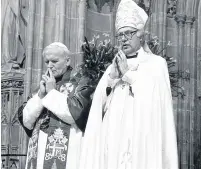  ??  ?? Pope John Paul II and the Archbishop of Canterbury