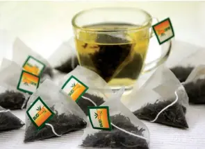  ??  ?? The pyramidsha­ped tea bag of Bud White Tea
leaves room for the whole tea leaf to expand when dipped in
hot water